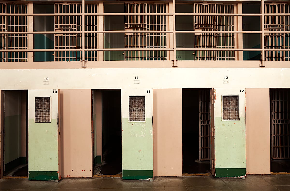 https://ml38gwtypwbg.i.optimole.com/w:1200/h:791/q:mauto/f:best/https://impartial.one/wp-content/uploads/2024/07/alcatraz-d-block-solitary-confinement-cells.png